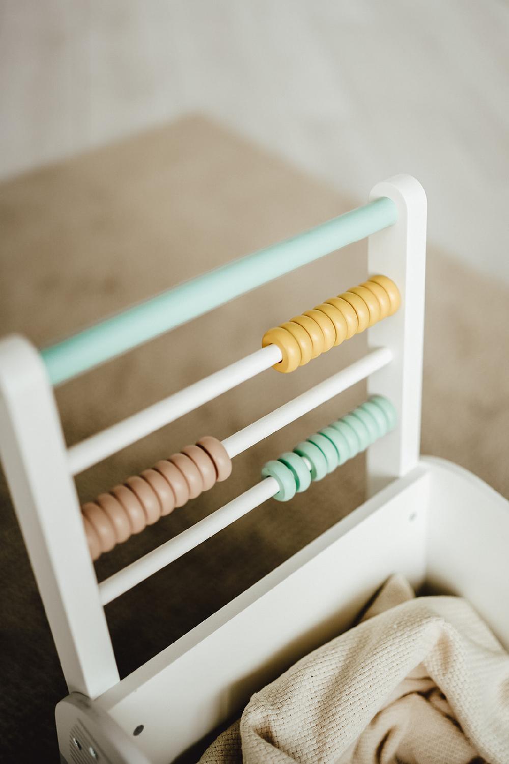 babymarkt Lauflernwagen turbus Regenbogen Valentinstagsangebot
