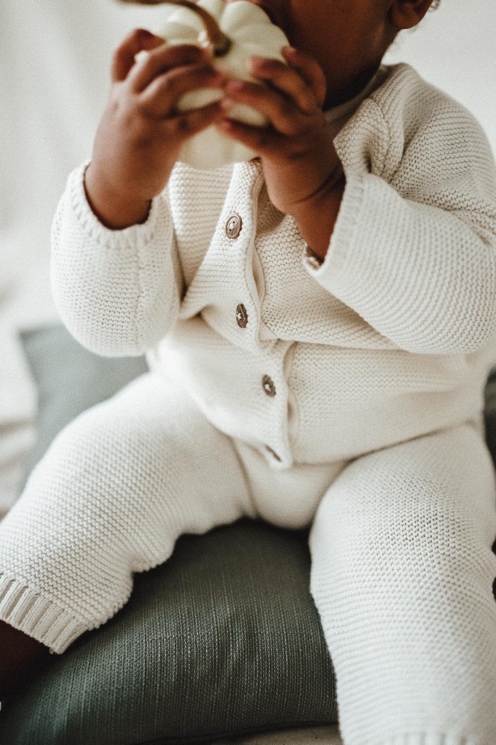 babymarkt Strickoverall strikka Grobstrick creme Wochenangebot
